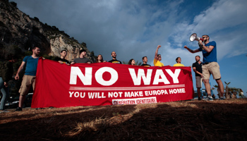 Far right demonstrators protest against migrants crossing on the Mediterranean Sea in 2015 (Reuters/Eric Gaillard)