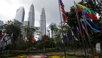 National flags and the ASEAN logo on display ahead of the 27th ASEAN summit in Kuala Lumpur (Reuters/Olivia Harris)