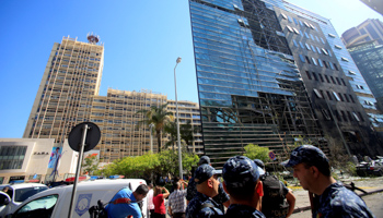 Police secure the site of an explosion outside BLOM Bank in Beirut (Reuters/Jamal Saidi)