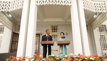 US President Barack Obama and then-opposition politician Aung San Suu Kyi hold a press conference after meeting at her residence in Yangon, November 14, 2014 (Reuters/Kevin Lamarque)