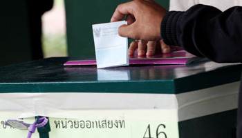 A soldier casts his ballot during a constitutional referendum (Reuters/Kerek Wongsa)