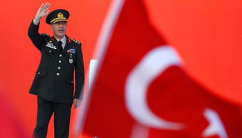 Turkey's Chief of the General Staff Hulusi Akar greets audience during the mass rally in Istanbul on August 7 after the failed July coup. (Reuters/Osman Orsal)