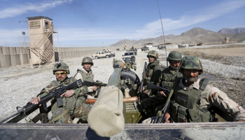 Afghan army personnel on patrol (Reuters/Omar Sobhani)