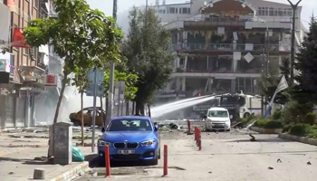 A water cannon used after a car bomb is detonated near local government offices (Reuters/via Reuters TV)
