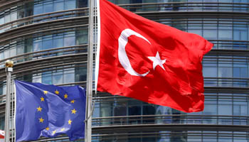EU (left) and Turkish flags fly outside a hotel in Istanbul. (Reuters/Murad Sezer)