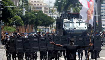 Riot police at a protest over spending curbs in Rio de Janeiro (Reuters/Ricardo Moraes)