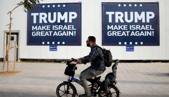 Signs bearing the name of U.S. President-elect Republican Donald Trump in Tel Aviv, Israel (Reuters/Baz Ratner)