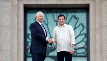 Philippines President Rodrigo Duterte, right, and Malaysia's Prime Minister Najib Razak in Putrajaya (Reuters/Edgar Su)