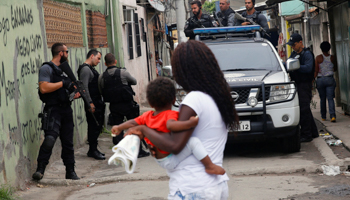 A police anti-drugs operation in the Cidade de Deus slum, Rio de Janeiro (Reuters/Ricardo Moraes)