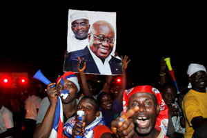 Supporters of Ghana's president-elect Nana Akufo-Addo of the opposition New Patriotic Party celebrate on a street in Accra (Reuters/Luc Gnago)