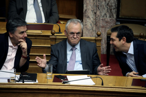 Right to left, Prime Minister Alexis Tsipras, Deputy Prime Minister Yannis Dragasakis and Finance Minister Euclid Tsakalotos at a parliament's budget vote, December 10 (Reuters/Alkis Konstantinidis)
