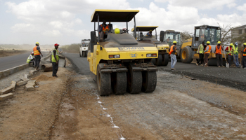 Labourers construct the Southern bypass road next to the Nairobi National Park in Kenya's capital Nairobi (Reuters/Thomas Mukoya)
