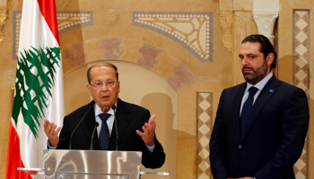 Christian politician and FPM founder Michel Aoun, left, and former prime minister Saad al-Hariri (Reuters/Mohamed Azakir)