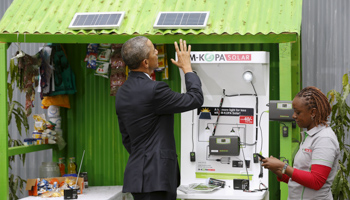 US President Barack Obama with a solar power businessperson at the Power Africa Innovation Fair, UN compound in Nairobi (Reuters/Jonathan Ernst)