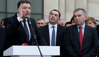 Leaders of the opposition United National Movement, Gigi Ugulava, left, Giga Bokeria, centre and David Bakradze (Reuters/David Mdzinarishvili)