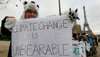 A Climate Change demonstrator in Paris, during the World Climate Change Conference in 2015 (Reuters/Mal Langsdon)