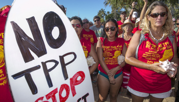 Anti-TPP protesters in Hawaii (Reuters/Marco Garcia)