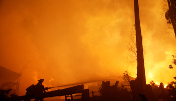 Firefighters in Santa Olga (Reuters/Rodrigo Garrido)