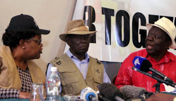 Zimbabwe opposition party leaders Morgan Tsvangirai (R), Joice Mujuru (L) and convener of the National Electroral Reform Agenda (NERA) Dydimus Mutasa (Reuters/Philimon Bulawayo)