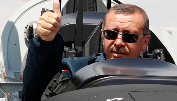 Turkish Prime Minister Tayyip Erdogan in the Turkish Primary and Basic Trainer Aircraft, during a ceremony at the Turkish Aerospace Industries in Ankara (Reuters/Umit Bektas)