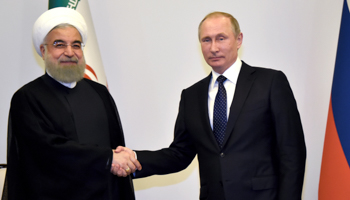 Russian President Vladimir Putin, right, with Iranian President Hassan Rouhani in Baku, Azerbaijan (Reuters/Alexander Nemenov)