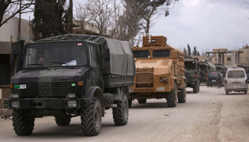 Turkish military vehicles drive through Syrian rebel-held Al-Rai towards Al-Bab (Reuters/Khalil Ashawi)