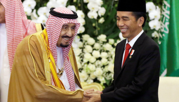 Saudi King Salman, left, shakes hands with Indonesian President Joko Widodo during their meeting at the presidential palace in Bogor, Indonesia (Reuters/Achmad Ibrahim/Pool)