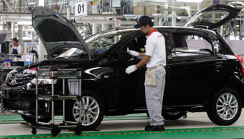 A worker at a Toyota plant in Indonesia (Reuters/Supri)