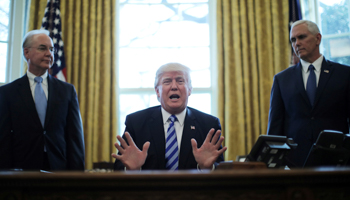 President Trump with Secretary of Health and Human Services Tom Price, left, and Vice President Mike Pence in the Oval Office, March, 2017 (Reuters/Carlos Barria)