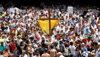 An April 21 opposition rally to honour those killed in a week of violent protests (Reuters/Christian Veron)