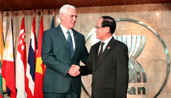 US Vice President Mike Pence, left, with ASEAN Secretary-General Le Luong Minh at the ASEAN Secretariat in Jakarta (Reuters/Mast Irhaml)