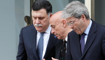 Libyan Prime Minister Fayez Serraj, left, with Italian Interior Minister Marco Minniti, centre, and Prime Minister Paolo Gentiloni in Rome  (Reuters/Remo Casilli)