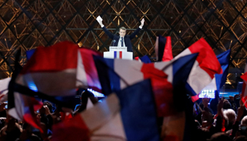 French President-elect Emmanuel Macron celebrates on the stage at his victory rally near the Louvre in Paris, France May 7, 2017. (Reuters/Christian Hartmann)