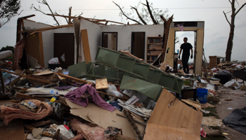 Blockchain technology could improve the efficiency of pricing and pay-outs for catastrophe insurance written against natural disasters such as the 2013 tornado that devastated Oklahoma (Reuters/Adrees Latif)