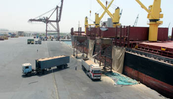A ship unloads grain at the Red Sea port of Hodeidah, Yemen (Reuters/Abduljabbar Zeyad)