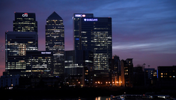 The Canary Wharf business district at dusk in London (Reuters/Toby Melville)