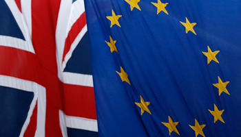 A Union flag next to the flag of the European Union (Reuters/Stefan Wermuth)