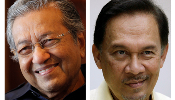 A combination photo shows Malaysia's former prime minister Mahathir Mohamad, left and jailed opposition leader Anwar Ibrahim (Reuters/Bazuki Muhammad)