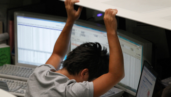 An employee of the Tokyo Stock Exchange (Reuters/Kim Kyung-Hoon)