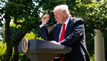 President Donald Trump announces his decision that the United States will withdraw from the Paris climate pact (REUTERS/Joshua Roberts)