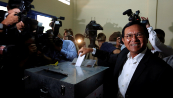 President of the opposition Cambodia National Rescue Party Kem Sokha casts his vote during local elections in Kandal province, Cambodia (Reuters/Samrang Pring)