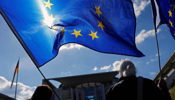 "Pulse of Europe" supporters hold EU flags in front of the the Chancellery in Berlin, Germany (Reuters/Hannibal Hanschke)