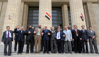 A group of judges after an internal disciplinary court upheld a ruling to forcibly retire them in Cairo, Egypt, 2016 (Reuters/Staff)