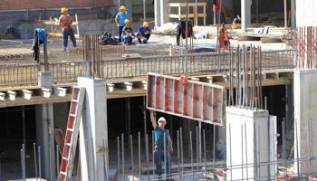 Workers on a construction site in Budapest (Reuters/Bernadett Szabo)