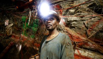 A mine employee at Sibanye Gold's Masimthembe shaft in Westonaria (Reuters/Mike Hutchings)