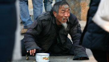 A beggar in Beijing (Reuters/David Gray)
