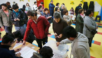 A man casts his vote for the primaries in Chile's presidential election in Vina del Mar, Chile (Reuters/Rodrigo Garrido)