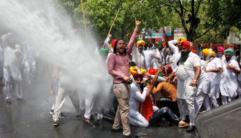 Police use water cannon to disperse protesting farmers in Chandigarh (Reuters/Ajay Verma)