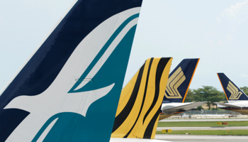 Silkair, Tigerair and Singapores Airlines planes at Changi Airport, Singapore (Reuters/Edgar Su)