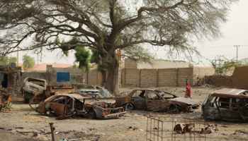 Burnt vehicles in Damasak, Borno state (Reuters/Afolabi Sotunde)